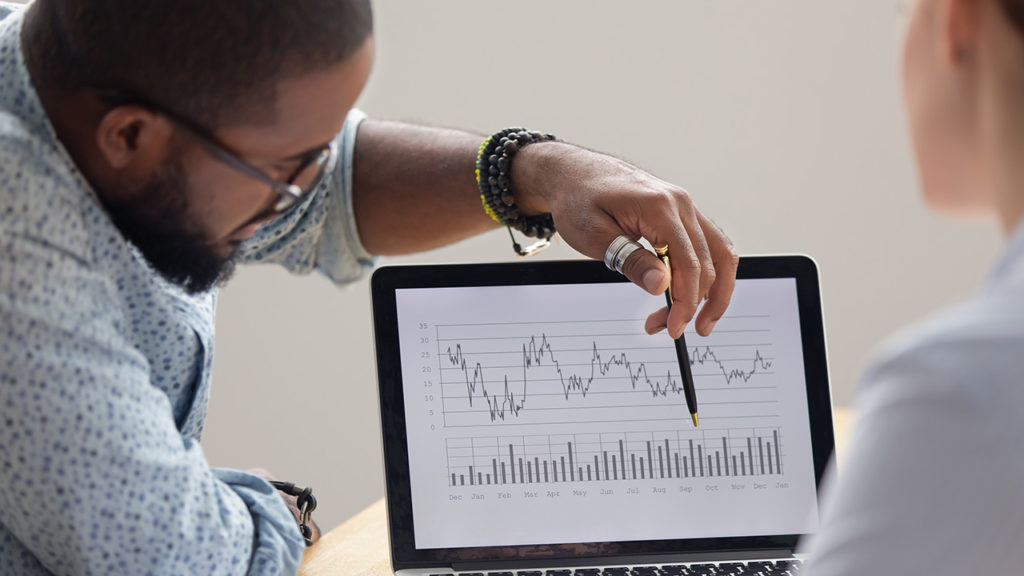 Man pointing at a chart