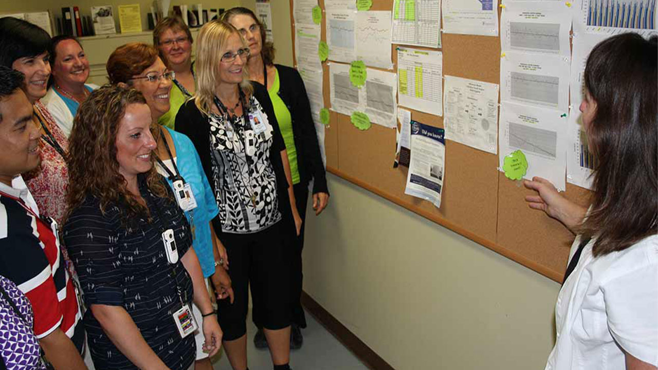 Group of people in a room for work training